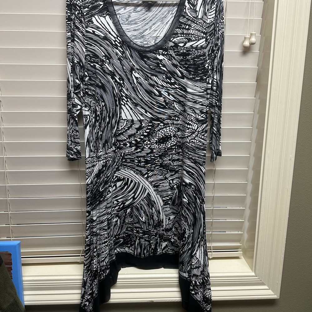 Black and white dress, with longer sides